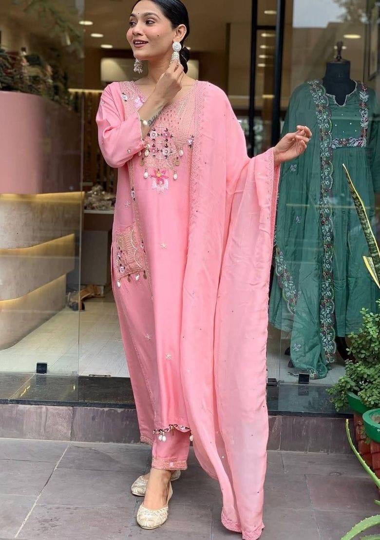 Featuring beautifully Crafted Pure Roman Silk Suits in beautiful Colours, which are decorated with finest sequence & Cowry Embroidery Work (RRRD02)