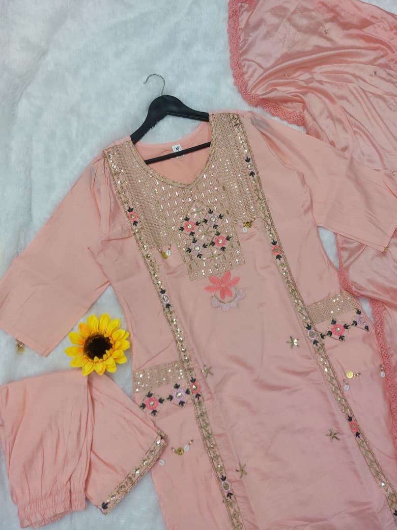 Featuring beautifully Crafted Pure Roman Silk Suits in beautiful Colours, which are decorated with finest sequence & Cowry Embroidery Work (RRRD02)