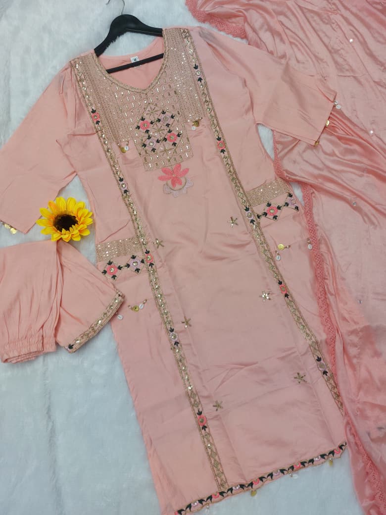 Featuring beautifully Crafted Pure Roman Silk Suits in beautiful Colours, which are decorated with finest sequence & Cowry Embroidery Work (RRRD02)