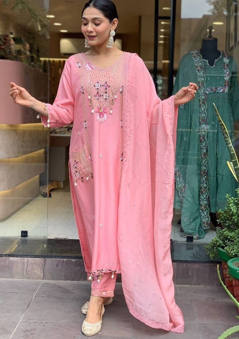 Featuring beautifully Crafted Pure Roman Silk Suits in beautiful Colours, which are decorated with finest sequence & Cowry Embroidery Work (RRRD02)